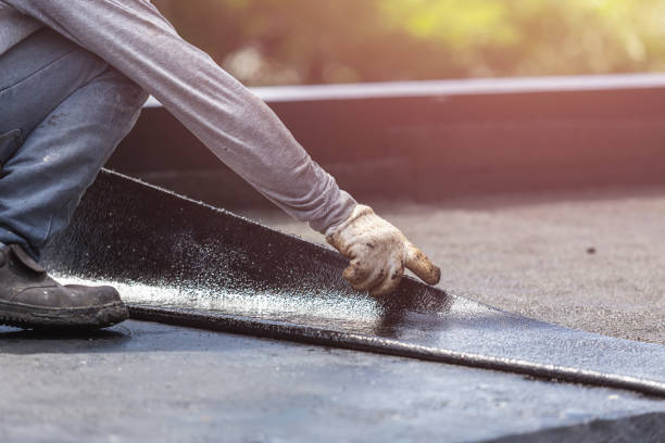 Professional Basement Waterproofing technician working in Oxford, GA